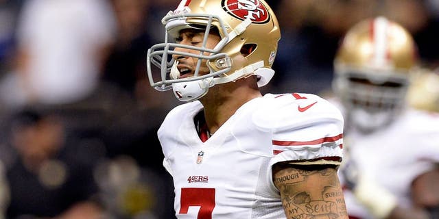 Nov 17, 2013; New Orleans, LA, USA; San Francisco 49ers quarterback Colin Kaepernick (7) reacts following a failed third down conversion against the New Orleans Saints during the fourth quarter at the Mercedes-Benz Superdome. The New Orleans Saints defeated the San Francisco 49ers 23-20. Mandatory Credit: John David Mercer-USA TODAY Sports