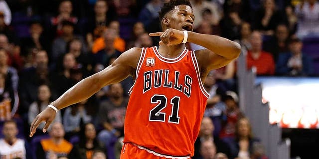 PHOENIX, AZ - NOVEMBER 18: Jimmy Butler #21 of the Chicago Bulls reacts after hitting a three point shot against the Phoenix Suns during the first half of the NBA game at Talking Stick Resort Arena on November 18, 2015 in Phoenix, Arizona. NOTE TO USER: User expressly acknowledges and agrees that, by downloading and or using this photograph, User is consenting to the terms and conditions of the Getty Images License Agreement. (Photo by Christian Petersen/Getty Images)