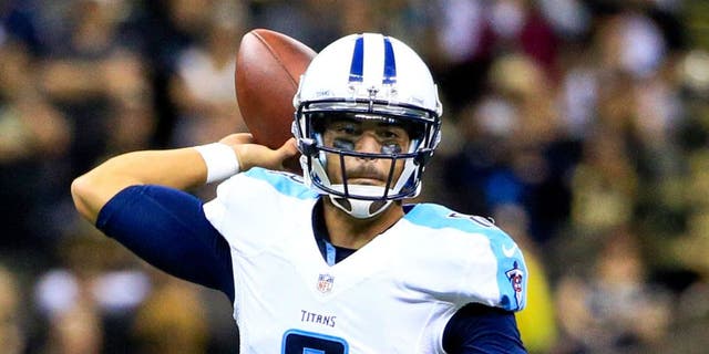 Nov 8, 2015; New Orleans, LA, USA; Tennessee Titans quarterback Marcus Mariota (8) against the New Orleans Saints during the second half of a game at the Mercedes-Benz Superdome. The Titans defeated the Saints 34-28 in overtime. Mandatory Credit: Derick E. Hingle-USA TODAY Sports