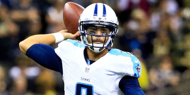 Nov 8, 2015; New Orleans, LA, USA; Tennessee Titans quarterback Marcus Mariota (8) against the New Orleans Saints during the second half of a game at the Mercedes-Benz Superdome. The Titans defeated the Saints 34-28 in overtime. Mandatory Credit: Derick E. Hingle-USA TODAY Sports