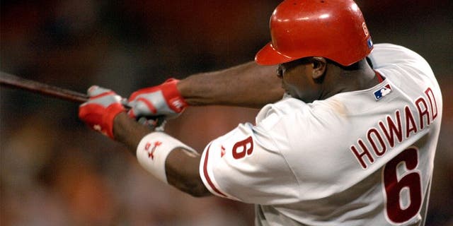 WASHINGTON - AUGUST 31: Ryan Howard #6 of the Philadelphia Phillies hits his 49th home run of the season giving him the Phillies single season record, previously held by Hall of Famer Mike Schmidt (1980), in the baseball game against the Washington Nationals on August 31, 2006 at RFK Stadium in Washington D.C. The Nationals won in 10 innings 6-5. (Photo by Mitchell Layton/Getty Images) *** Local Caption *** Ryan Howard