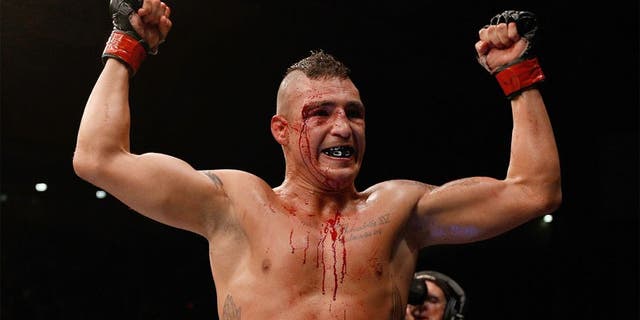 ALBUQUERQUE, NM - JUNE 07: Diego Sanchez celebrates after the conclusion of his lightweight fight against Ross Pearson during the UFC Fight Night event at Tingley Coliseum on June 7, 2014 in Albuquerque, New Mexico. (Photo by Josh Hedges/Zuffa LLC/Zuffa LLC via Getty Images)