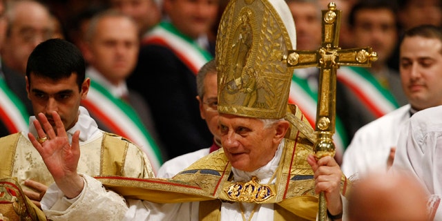 Nov. 20: Pope Benedict XVI blesses the faithful during a consistory inside St. Peter's Basilica, at the Vatican.