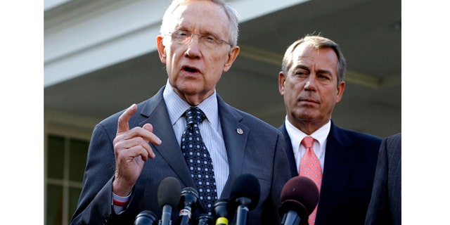 Nov. 16, 2012: Senate Majority Leader Harry Reid of Nev., left, with House Speaker John Boehner of Ohio looking on, speaking to reporters outside the White House in Washington following a meeting with President Barack Obama to discuss the economy and the deficit.