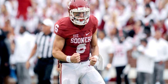Oct 24, 2015; Norman, OK, USA; Oklahoma Sooners quarterback Baker Mayfield (6) celebrates after a touchdown pass against the Texas Tech Red Raiders during the third quarter at Gaylord Family - Oklahoma Memorial Stadium. Mandatory Credit: Mark D. Smith-USA TODAY Sports