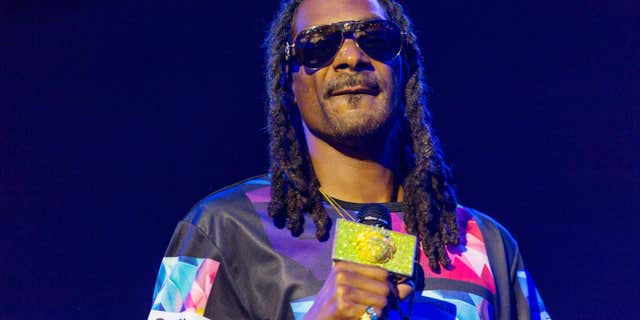 FILE - In this Sat., Sept. 26, 2015 file photo, Snoop Dogg performs during the Life is Beautiful festival in Las Vegas.