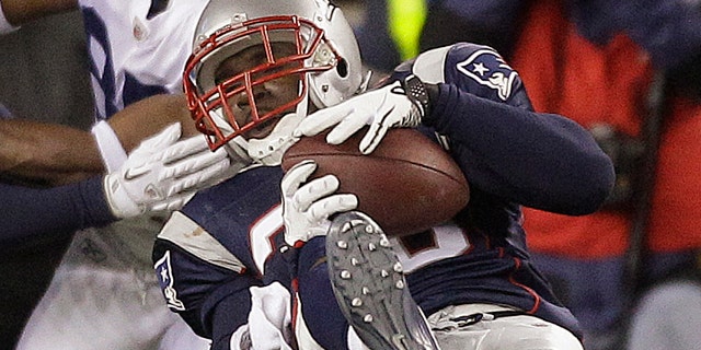 Nov. 21: New England Patriots safety James Sanders (36) intercepts Indianapolis Colts quarterback Peyton Manning pass during the waning seconds of the fourth quarter of their NFL football game in Foxborough, Mass.