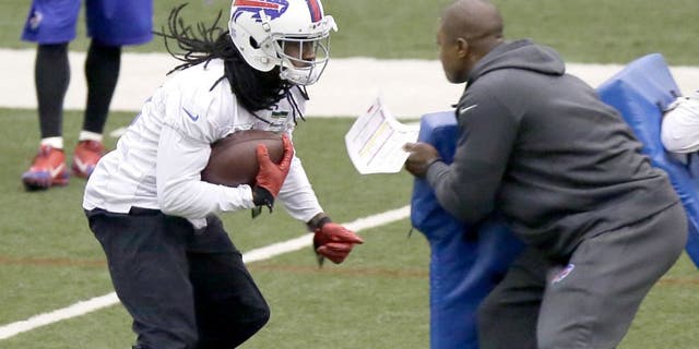 Buffalo Bills wide receiver Sammy Watkins, left, runs a drill during practice at the Detroit Lions' indoor NFL football training facility in Allen Park, Mich., Saturday, Nov. 22, 2014. The Bills are using the facility in preparation for Monday's game against the Jets, which was moved to Detroit because of the snowstorm in Buffalo. (AP Photo/Duane Burleson)