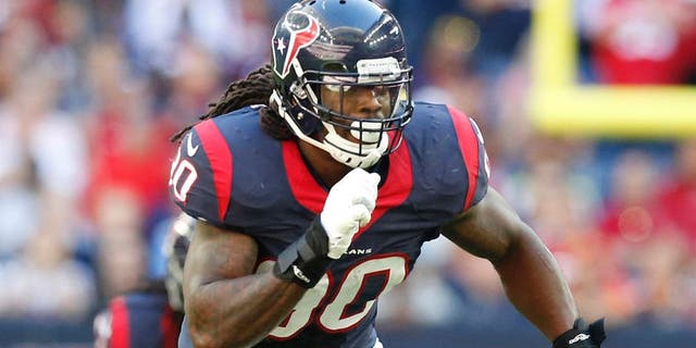 Nov 23, 2014; Houston, TX, USA; Houston Texans outside linebacker Jadeveon Clowney (90) in action against the Cincinnati Bengals at NRG Stadium. Mandatory Credit: Matthew Emmons-USA TODAY Sports