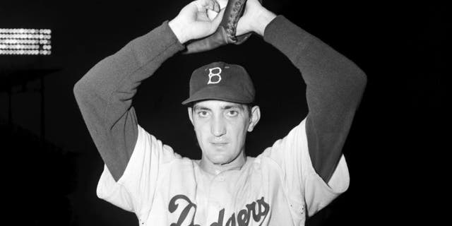 BROOKLYN, NY - 1952: Pitcher Ralph Branca, of the Brooklyn Dodgers, poses for a portrait prior to a game in 1952 at Ebbets Field in Brooklyn, New York. Branca says he's not superstitious, but changed his uniform number from "13" to "12" this season after he surrended the pennant-clinching home run to Bobby Thomson of the New York Giants in the bottom of the ninth inning in the final game of the playoff series to decide the 1951 National League pennant. Ralph Branca5201 Kidwiler Collection/Diamond Images®