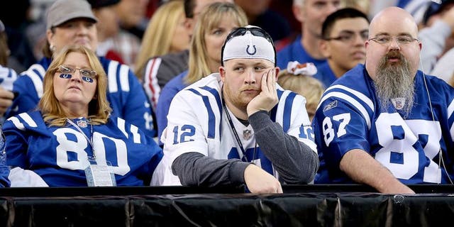 GLENDALE, AZ - NOVEMBER 24: Fans of the Indianapolis Colts react during the NFL game against the Arizona Cardinals at the University of Phoenix Stadium on November 24, 2013 in Glendale, Arizona. (Photo by Christian Petersen/Getty Images)