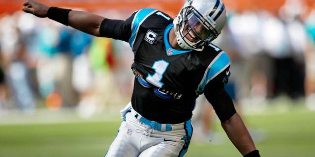 Nov 24, 2013; Miami Gardens, FL, USA; Carolina Panthers quarterback Cam Newton (1) before playing against the Miami Dolphins at Sun Life Stadium. Mandatory Credit: Robert Mayer-USA TODAY Sports