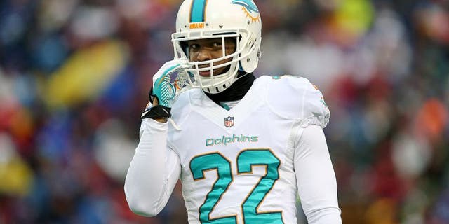 ORCHARD PARK, NY - DECEMBER 22: Jamar Taylor #22 of the Miami Dolphins during NFL game action against the Buffalo Bills at Ralph Wilson Stadium on December 22, 2013 in Orchard Park, New York. (Photo by Tom Szczerbowski/Getty Images)