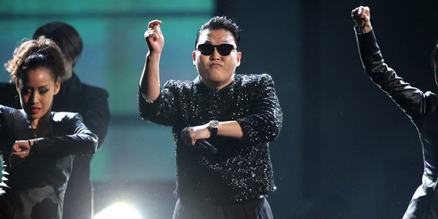 PSY performs Gangnam Style at the 40th Anniversary American Music Awards on Sunday, Nov. 18, 2012, in Los Angeles. (Photo by Matt Sayles/Invision/AP)