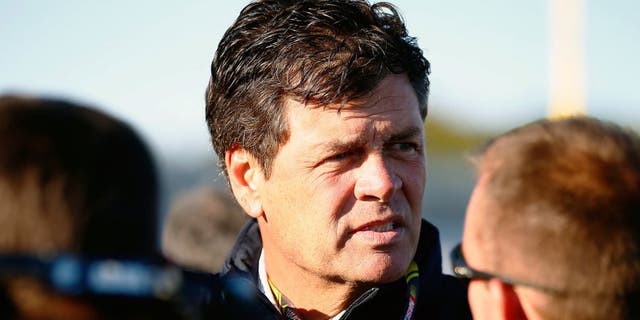 LOUDON, NH - SEPTEMBER 19: Team owner Michael Waltrip looks on during qualifying for the NASCAR Sprint Cup Series Sylvania 300 at New Hampshire Motor Speedway on September 19, 2014 in Loudon, New Hampshire. (Photo by Jared Wickerham/Getty Images)
