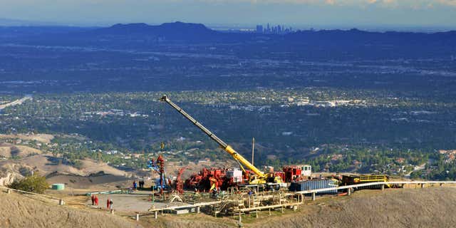 FILE - In this Nov. 3, 2015, file photo, provided by Southern California Gas Co. shows equipment being used as SoCalGas crews and technical experts try to stop the flow of natural gas leaking from a storage well at the utility's Aliso Canyon facility near the Northridge section of Los Angeles.