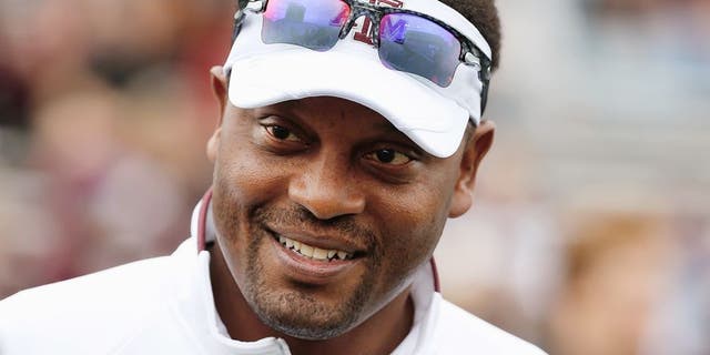 COLLEGE STATION, TX - NOVEMBER 09: Head coach Kevin Sumlin of the Texas A&amp;M Aggies waits on the field before the game against the Mississippi State Bulldogs at Kyle Field on November 9, 2013 in College Station, Texas. (Photo by Scott Halleran/Getty Images)