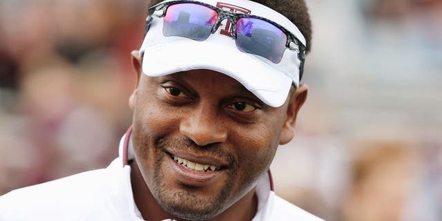 COLLEGE STATION, TX - NOVEMBER 09: Head coach Kevin Sumlin of the Texas A&M Aggies waits on the field before the game against the Mississippi State Bulldogs at Kyle Field on November 9, 2013 in College Station, Texas. (Photo by Scott Halleran/Getty Images)