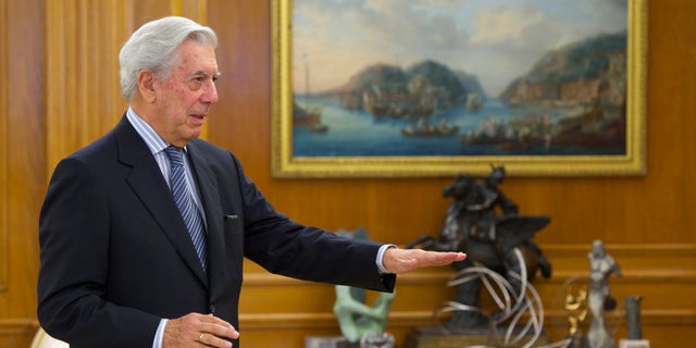 Mario Vargas Llosa poses for the photographers at the Zarzuela Palace on May 11, 2011 in Madrid, Spain.