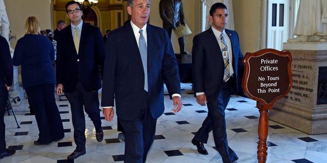 House Speaker John Boehner of Ohio walks back to his office on Capitol, Wednesday, Jan. 14, 2015.