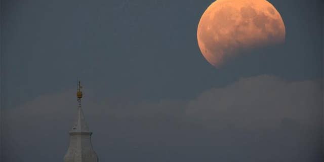 This Aug. 7, 2017 photo shows the partial lunar eclipse photographed from Tiszafoldvar, Hungary.