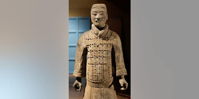 A terra cotta statue is unpacked for the exhibition "Terra Cotta Warriors: Guardians of China's First Emperor," at the Bowers Museum in Santa Ana, Calif., in this file photo.