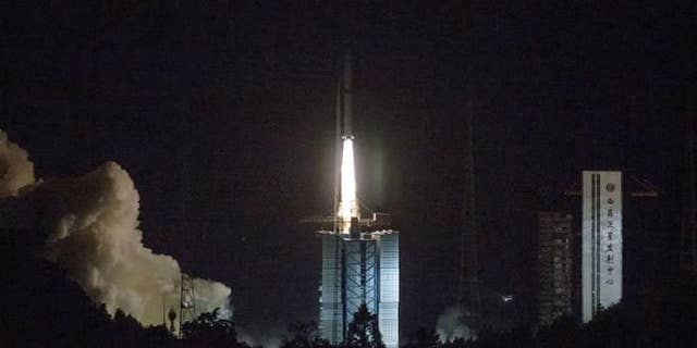 In this photo, a Long March 4C rocket carrying the Queqiao ("Magpie Bridge") satellite is launched from southwest China's Xichang Satellite Launch Center on Monday.