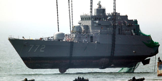April 24: Sunken South Korean naval ship Cheonan is lifted from waters near the disputed sea border with North Korea.
