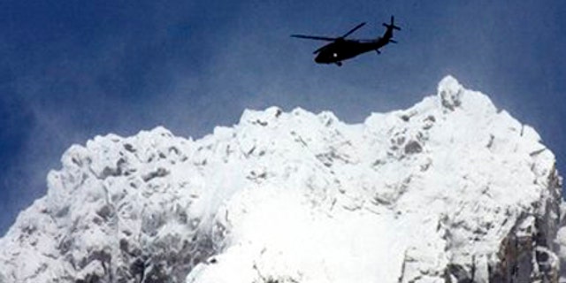 Dec. 13: A helicopter flies over Mount Hood in search of two missing climbers.