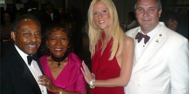 Sept. 26: Michaele and Tareq Salahi, right, with Sen. Roland Burris, D-Ill., left, and his wife Berlean at the Congressional Black Caucus Foundation's Awards Dinner in Washington. (AP)