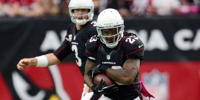 Oct 4, 2015; Glendale, AZ, USA; Arizona Cardinals running back Chris Johnson (23) runs the ball against the St. Louis Rams during the first half at University of Phoenix Stadium. The Rams won 24-22. Mandatory Credit: Joe Camporeale-USA TODAY Sports