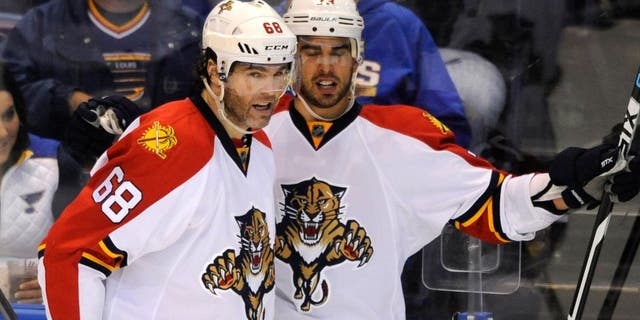 Florida Panthers' Brandon Pirri, right, celebrates with teammate Jaromir Jagr (68), of the Czech Republic, his goal against the St. Louis Blues during the second period of an NHL hockey game, Tuesday, Dec. 1, 2015, in St. Louis. (AP Photo/Bill Boyce)