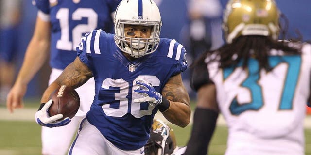 Nov 23, 2014; Indianapolis, IN, USA; Indianapolis Colts running back Dan Herron (36) runs the ball during the first quarter against the Jacksonville Jaguars at Lucas Oil Stadium. Mandatory Credit: Pat Lovell-USA TODAY Sports
