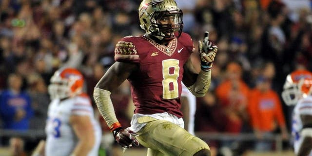 Nov 29, 2014; Tallahassee, FL, USA; Florida State Seminoles defensive back Jalen Ramsey (8) celebrates during the game against the Florida Gators at Doak Campbell Stadium. Mandatory Credit: Melina Vastola-USA TODAY Sports