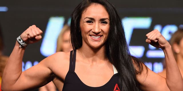 LAS VEGAS, NV - APRIL 20: Carla Esparza steps on the scale during the UFC 197 weigh-in at the MGM Grand Garden Arena on April 20, 2016 in Las Vegas, Nevada. (Photo by Josh Hedges/Zuffa LLC/Zuffa LLC via Getty Images)