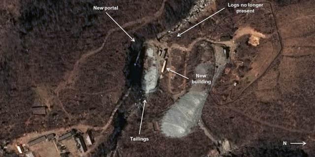Oct. 25, 2015: This image provided by the U.S.-Korea Institute at the Johns Hopkins School of Advanced International Studies via 38 North and via a satellite image from Centre National d’Études Spatiales and Airbus Defense & Space, shows a satellite image of what appears to be a new tunnel under mountains where North Korea conducts nuclear test explosions.