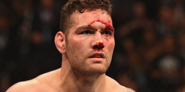 LAS VEGAS, NV - MAY 23: Chris Weidman reacts to his victory over Vitor Belfort of Brazil in their UFC middleweight championship bout during the UFC 187 event at the MGM Grand Garden Arena on May 23, 2015 in Las Vegas, Nevada. (Photo by Josh Hedges/Zuffa LLC/Zuffa LLC via Getty Images)