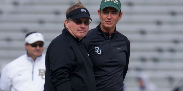 Nov 30, 2013; Fort Worth, TX, USA; TCU Horned Frogs head coach Gary Patterson and Baylor Bears head coach Art Briles before the game at Amon G. Carter Stadium. The Bears defeated the Horned Frogs 41-38. Mandatory Credit: Jerome Miron-USA TODAY Sports