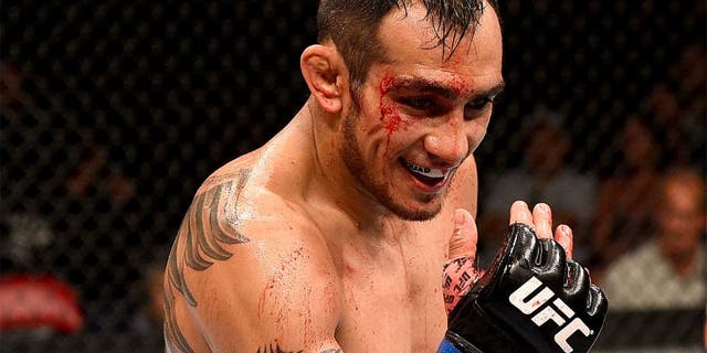 SAN DIEGO, CA - JULY 15: Tony Ferguson taunts Josh Thomson in their lightweight bout during the UFC event at the Valley View Casino Center on July 15, 2015 in San Diego, California. (Photo by Jeff Bottari/Zuffa LLC/Zuffa LLC via Getty Images)