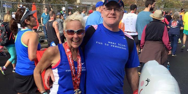 Kim Stemple and her husband, Jim, at the finish of the 2015 Marine Corps Marathon. (image courtesy Kim Stemple)