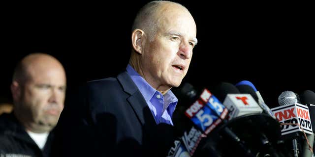 Dec. 3, 2015: California Gov. Jerry Brown reacts as he speaks during a press conference near the site of yesterday's mass shooting in San Bernardino, Calif.