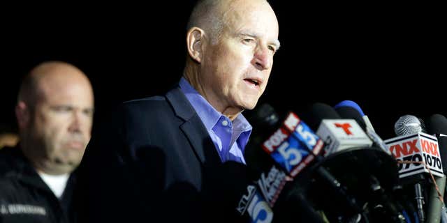 Dec. 3, 2015: California Gov. Jerry Brown reacts as he speaks during a press conference near the site of yesterday's mass shooting in San Bernardino, Calif.