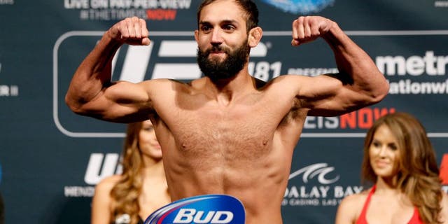 LAS VEGAS, NV - DECEMBER 05: Johny Hendricks poses on the scale after weighing in during the UFC 181 weigh-in inside the Mandalay Bay Events Center on December 5, 2014 in Las Vegas, Nevada. (Photo by Josh Hedges/Zuffa LLC/Zuffa LLC via Getty Images)