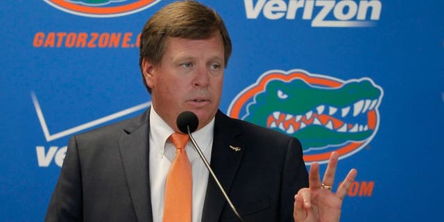 Dec 6, 2014; Gainesville, FL, USA; Florida Gators head coach Jim McElwain is introduced during a press conference at Ben Hill Griffin Stadium. Mandatory Credit: Kim Klement-USA TODAY Sports