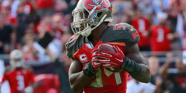 Dec 6, 2015; Tampa, FL, USA; Tampa Bay Buccaneers outside linebacker Lavonte David (54) intercepts the ball against the Atlanta Falcons during the second half at Raymond James Stadium. Tampa Bay defeated Atlanta 23-19. Mandatory Credit: Kim Klement-USA TODAY Sports