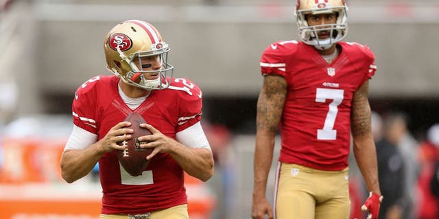 SANTA CLARA, CA - NOVEMBER 08: Colin Kaepernick #7 watches Blaine Gabbert #2 of the San Francisco 49ers warm up before their game against the Atlanta Falcons at Levi's Stadium on November 8, 2015 in Santa Clara, California. (Photo by Ezra Shaw/Getty Images)