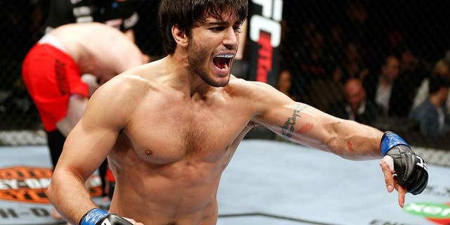 QUEBEC CITY, CANADA - APRIL 16: Elias Theodorou reacts after his TKO victory over Sheldon Wescott in their middleweight fight during the TUF Nations Finale at Colisee Pepsi on April 16, 2014 in Quebec City, Quebec, Canada. (Photo by Josh Hedges/Zuffa LLC/Zuffa LLC via Getty Images)