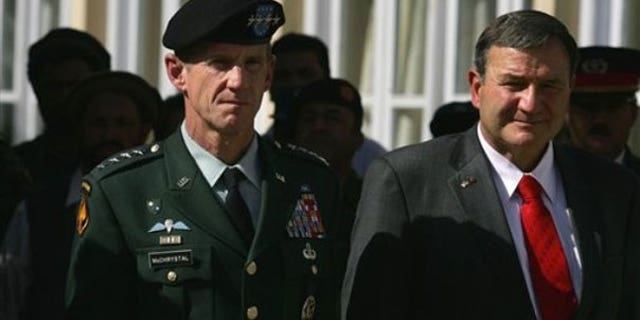 Oct. 14: NATO International Security Assistance Force, ISAF, Commander Stanley McChrystal, left, and U.S. Ambassador Karl Eikenberry look on during a memorial service to honor members of the Afghan National Security Forces who lost their lives in service to Afghanistan in Kabul, Afghanistan (AP).