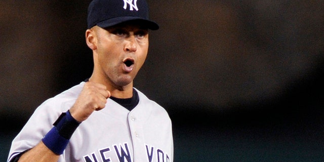 In this Oct. 20, 2009, file photo, New York Yankees' Derek Jeter reacts after the ninth inning of Game 4 of the American League Championship baseball series against the Los Angeles Angels in Anaheim, Calif.