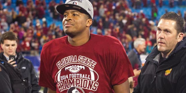Dec 6, 2014; Charlotte, NC, USA; Florida State Seminoles quarterback Jameis Winston (5) walks off the field after defeating the Georgia Tech Yellow Jackets at Bank of America Stadium. FSU defeated Georgia Tech 37-35. Mandatory Credit: Jeremy Brevard-USA TODAY Sports